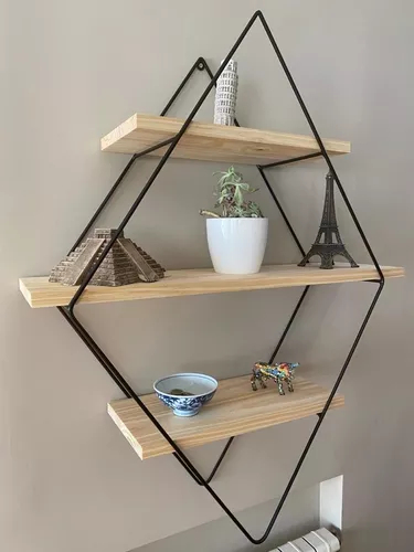 Estantería triangular con miniaturas de monumentos, una planta, un cuenco y una figura de caballo decorativo.