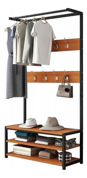 Ropero moderno con estantes y ganchos, ropa colgada, sombreros y cajas organizadoras. Ideal para espacios compactos.