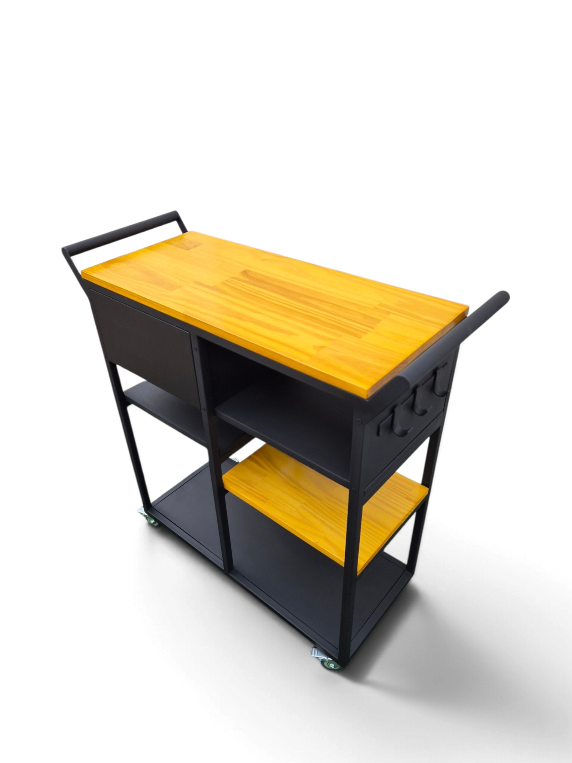 Mesa auxiliar con ruedas para cocina, 75x85x30 cm. Tono natural y estructura negro satinado. Incluye cajón y estantes, ideal para organizar y ampliar la superficie de trabajo