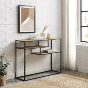 Mesa consola moderna con estructura de metal negro y estantes de madera. Diseño minimalista con dos niveles, ideal para decoración de interiores.