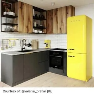 Cocina moderna con gabinetes de madera rústica, encimeras grises, y un refrigerador amarillo vintage. Electrodomésticos en negro y detalles metálicos completan el diseño.